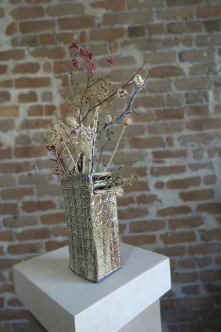 Impressed tall vase Stoneware vase with custom impressions and sprigs